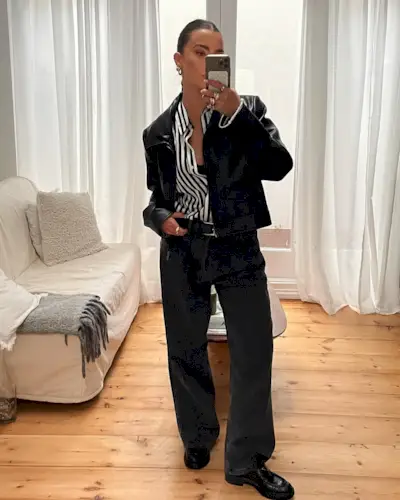 Woman wearing loafers with jeans outfit 2025.