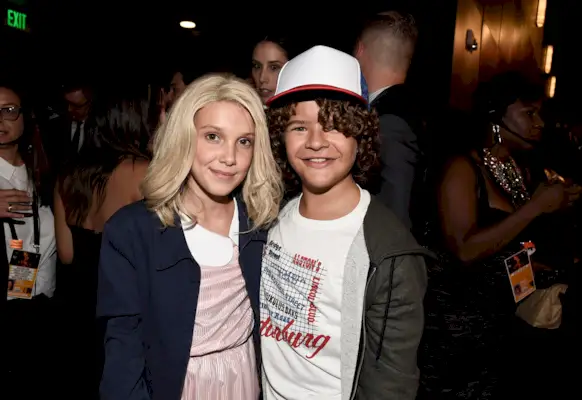 Millie Bobby Brown dressed as Eleven on the set of Stranger Things.