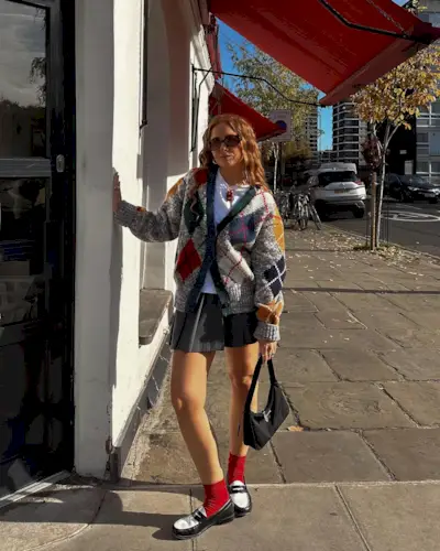 Influencer wears an argyle knit
