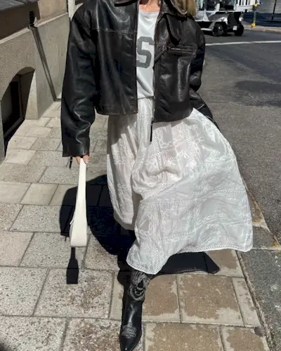 Model Elsa Hosk wears the tiered white maxi skirt london girl trend.