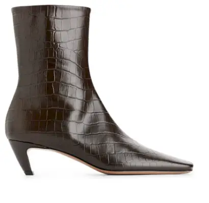 Georgia wears brown ankle boots with an all black look