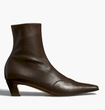 Emilie wears brown suede Gucci horsebit ankle boots