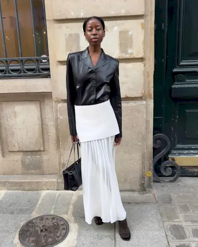 An image of @sylviemus wearing one of the biggest skirt trends for 2025.