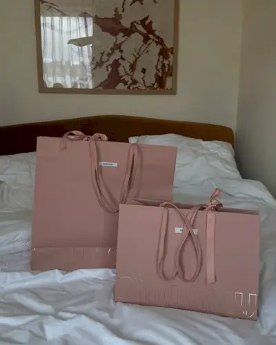 An image of @rebeccaferrazwyatt showcasing Miu Miu bags.