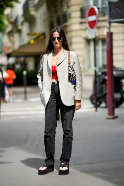 Influencer wears flip flop wedges.