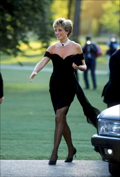 An image of Princess Diana wearing a Christina Stambolian 'revenge dress to an event in 1994, one of the most iconic '90s outfits.