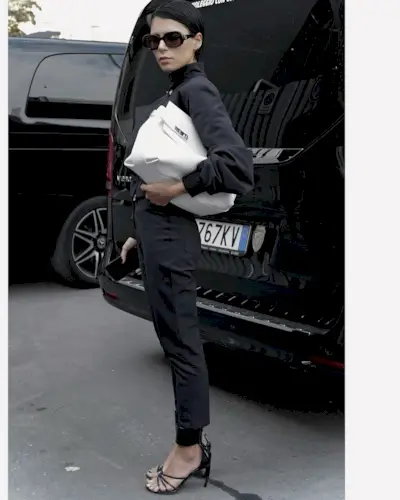 @endlesslyloveclub wearing strappy sandals with cigarette pants.