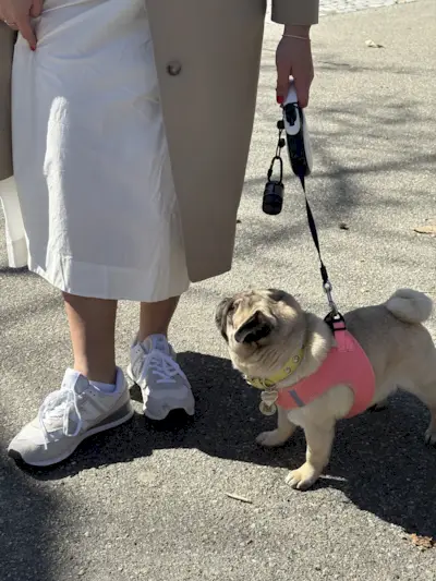 Photo of editor Ana Escalante reviewing New Balance 574 sneakers