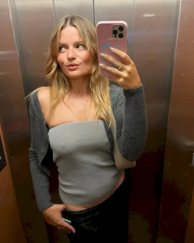 woman wearing tube top and cardigan