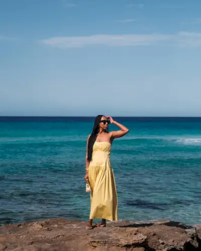 An image of @thandima wearing one of the key summer dress trends for 2025.