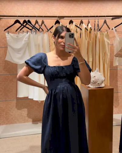 An image of @theindiaedit wearing one of the key summer dress trends for 2025.