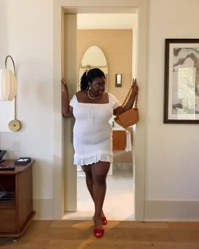 An image of @abimarvel wearing one of the key summer dress trends for 2025.