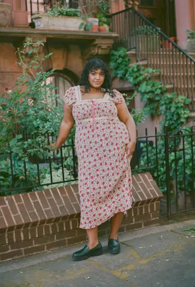 An image of @salome.mory wearing a zebra print sheer dress.