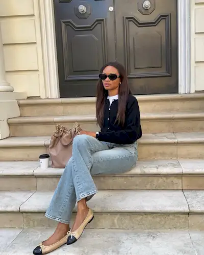 @lornasymphony wearing jeans and cardigan