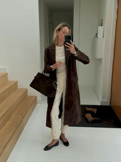 @anoukyve wearing jeans and ballet flats