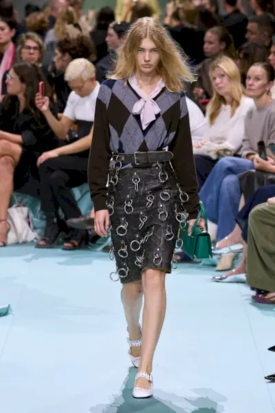 Model wears a pencil skirt on the Prada spring/summer 2025 runway.
