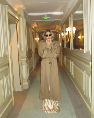 An image of @camillecharriere wearing cocktail attire.