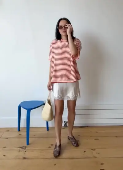 Woman in lace skirt and relaxed tee