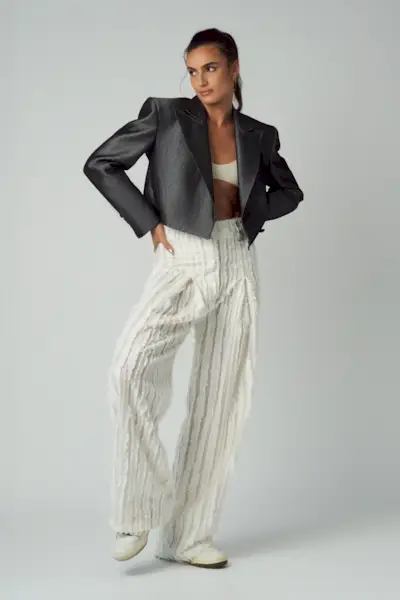 Woman wearing a Miami outfit idea.