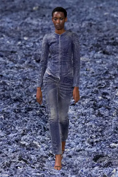 Model wears skinny jeans on the Diesel Spring/Summer 2025 runway.