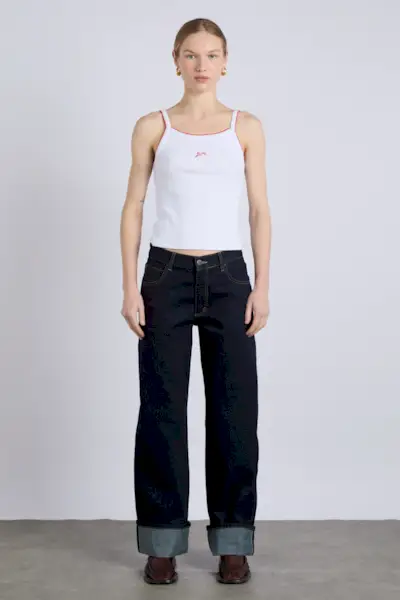 Model wears Horseshoe jeans on the Acne Spring/Summer 2025 runway.