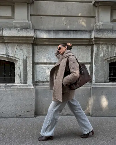 @maryljean wearing wide-leg jeans and ankle boots