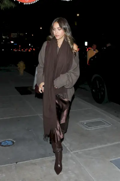 Jessica Alba in brown slike skirt and sweater