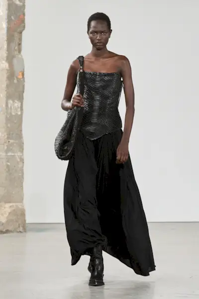 An image of a woven leather bag.