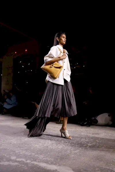 An image of a woven leather bag.