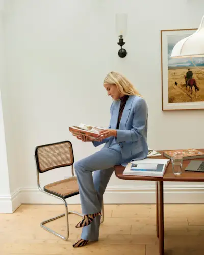 Boot Trends 2024: @lucywilliams02 wears a pair of animal print boots with a light blue suit