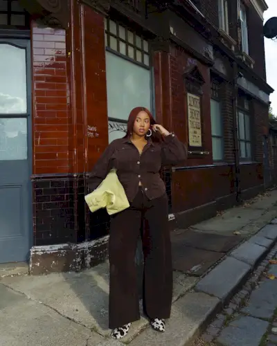 woman wearing cow print shoe outfit fall 2025