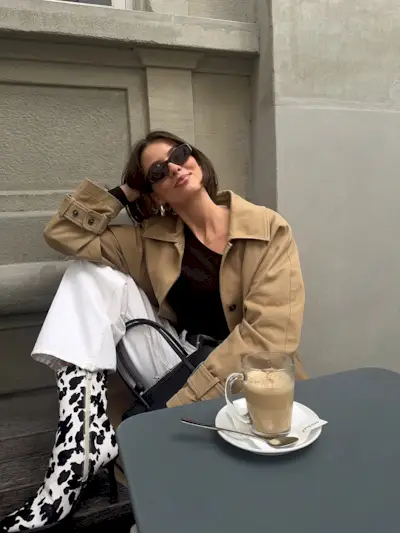 woman wearing cow print shoe outfit fall 2025