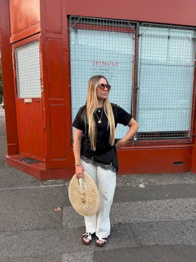 woman wearing cow print shoe outfit fall 2025