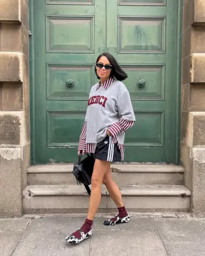 woman wearing cow print shoe outfit fall 2025