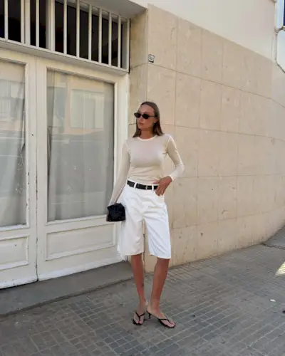 @martynakarolak wearing heeled flip-flops