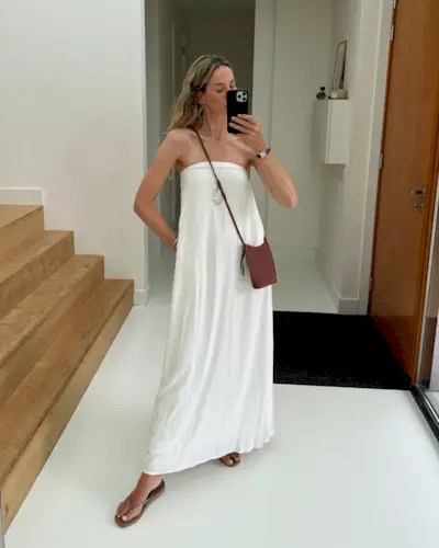 An image of @anoukyve wearing shoes with a midi dress.