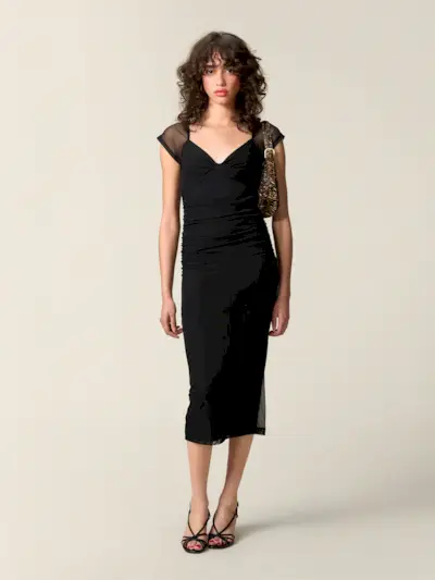 An image of influencer @annelauremais wearing an outfit made from the best French fashion brands.