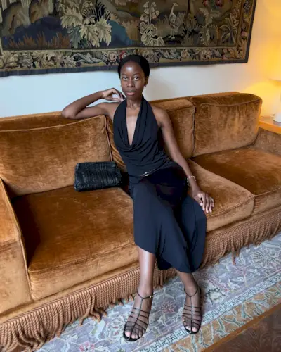 An image of @sylviemus_ wearing a halter neck top, one of the key summer tops trends of 2025.