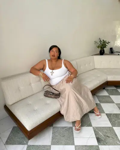 An influencer wearing a skirt.