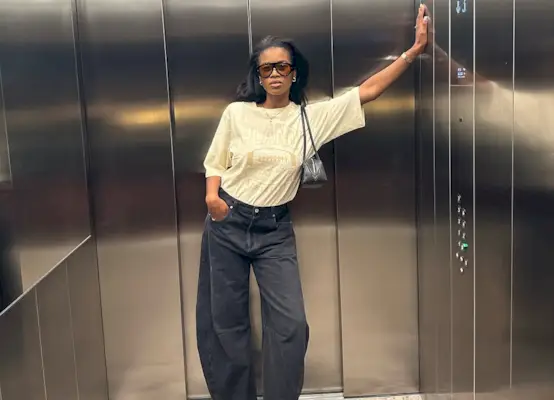 Marilyn wearing a t-shirt and jeans.