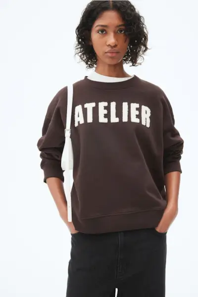 Sweatshirt With Text Motif