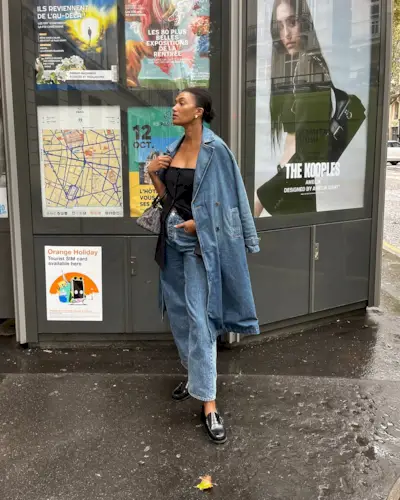 Woman wearing denim on denim outfit fall 2025.