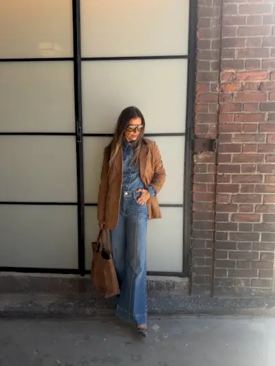 Woman wearing denim on denim outfit fall 2025.