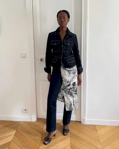 Woman wearing denim on denim outfit fall 2025.