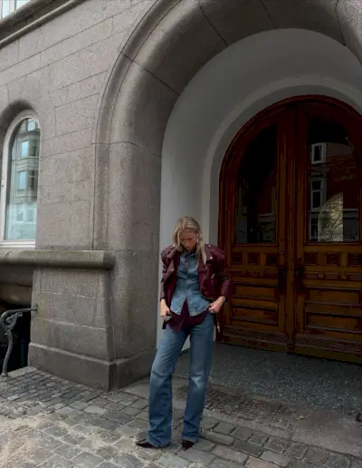 Woman wearing denim on denim outfit fall 2025.