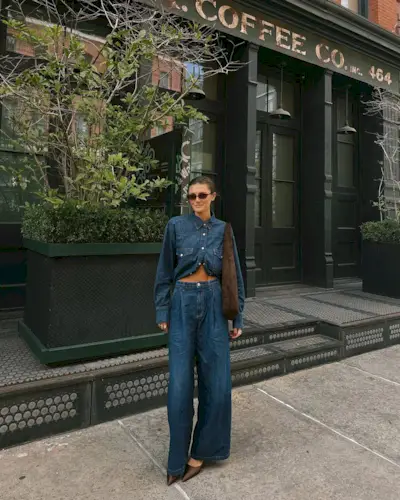 Woman wearing denim on denim outfit fall 2025.