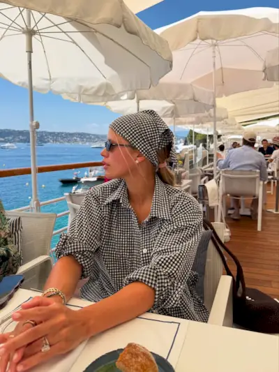 An image of @sofiagrainge wearing a bandana, one of the biggest summer accessories.