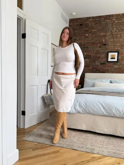 woman wearing fall skirt outfit 2025