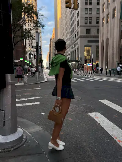 woman wearing fall skirt outfit 2025