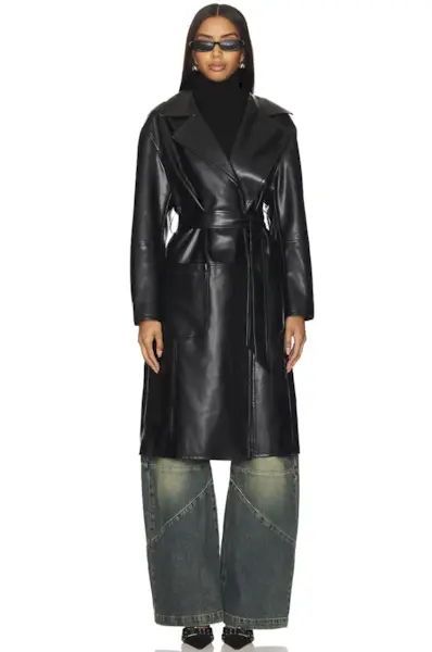 woman wearing fall skirt outfit 2025